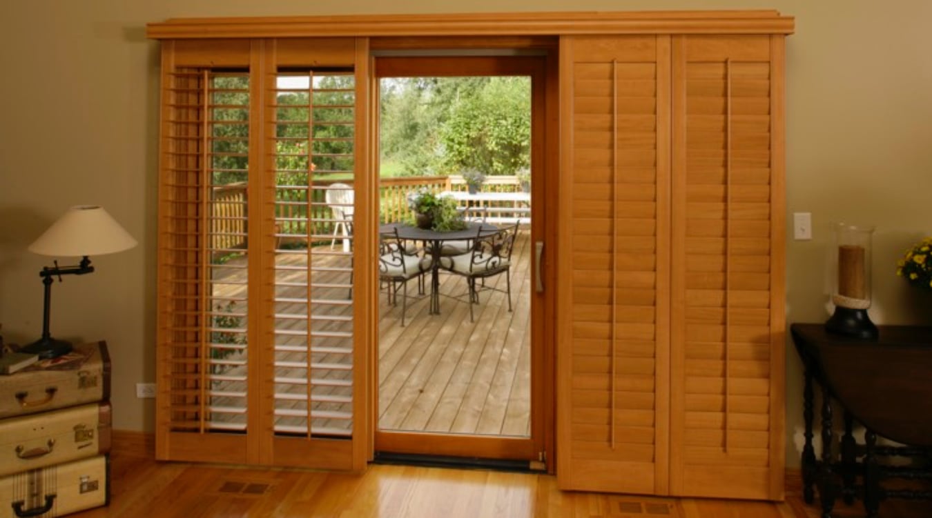 Plantation shutters on a sliding door